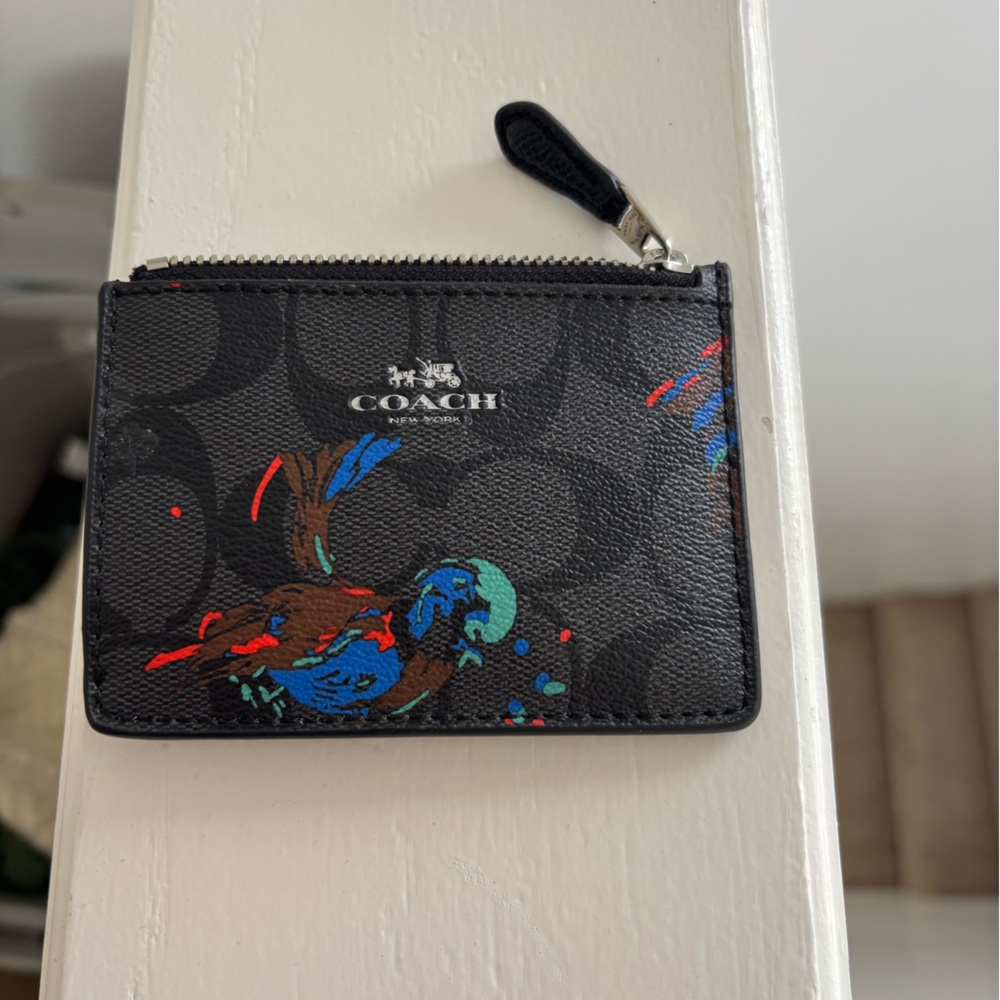 Coach Black Wallet with Vibrant Bird Motif